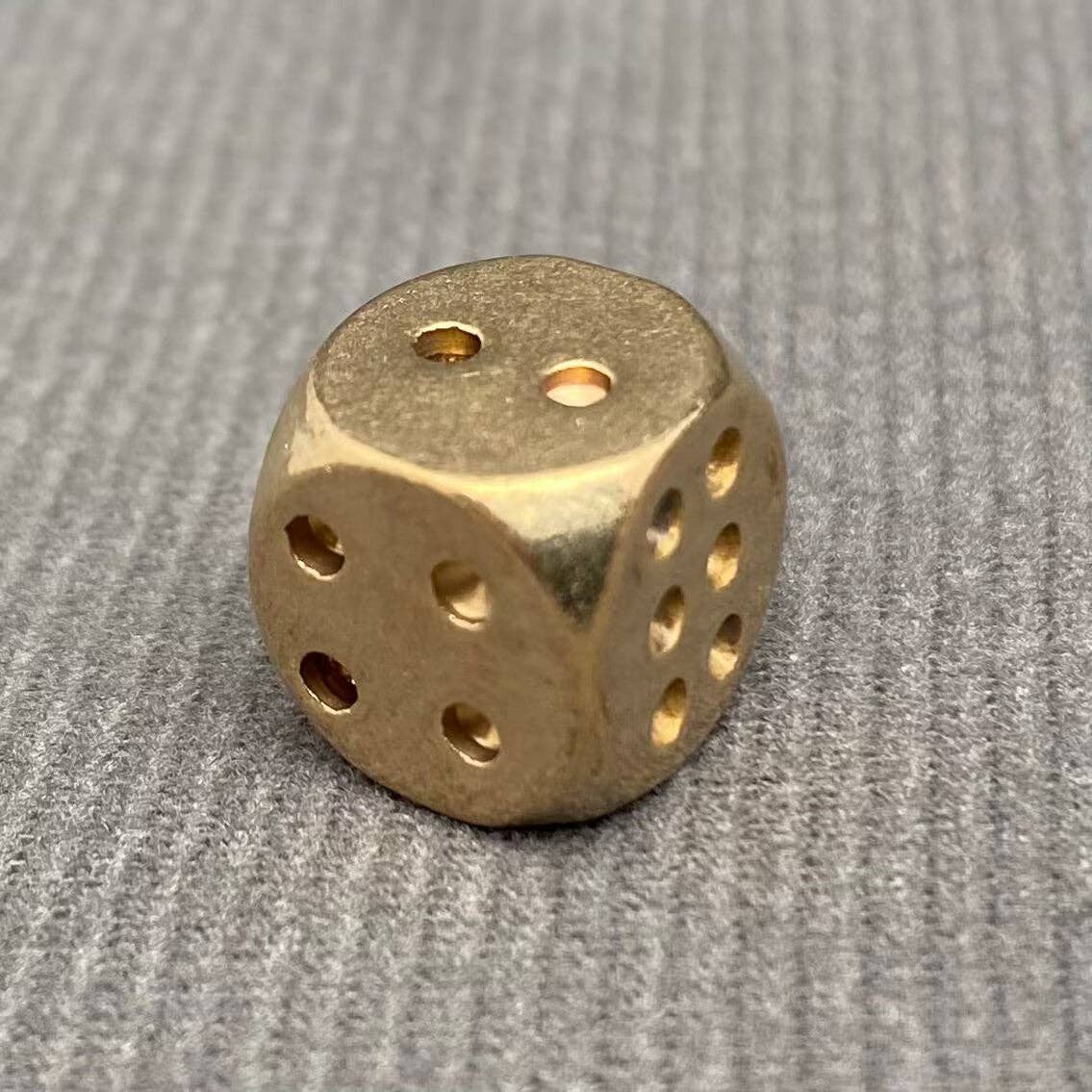 Brass Dice (1)