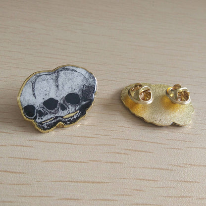 Golden Conjoined Skull Pin